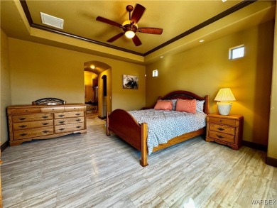 This spacious 2-story custom pool home in the gated Los Lagos on Los Lagos Golf Club in Arizona - for sale on GolfHomes.com, golf home, golf lot