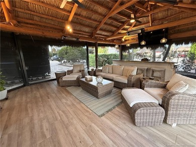 Discover a true g?m th?t r?define? luxur? and outdoor living! on St. Lucie Trail Golf Club in Florida - for sale on GolfHomes.com, golf home, golf lot