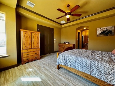 This spacious 2-story custom pool home in the gated Los Lagos on Los Lagos Golf Club in Arizona - for sale on GolfHomes.com, golf home, golf lot