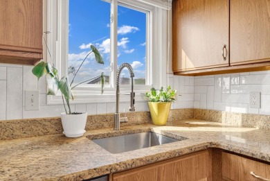 Beautiful second floor condo with amazing views of the sprawling on St. Clair Shores Country Club in Michigan - for sale on GolfHomes.com, golf home, golf lot