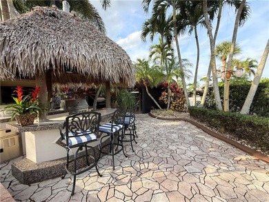 Discover a true g?m th?t r?define? luxur? and outdoor living! on St. Lucie Trail Golf Club in Florida - for sale on GolfHomes.com, golf home, golf lot