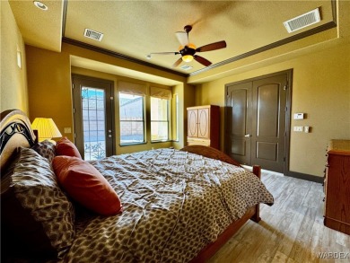 This spacious 2-story custom pool home in the gated Los Lagos on Los Lagos Golf Club in Arizona - for sale on GolfHomes.com, golf home, golf lot
