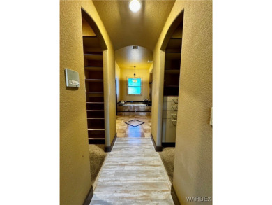 This spacious 2-story custom pool home in the gated Los Lagos on Los Lagos Golf Club in Arizona - for sale on GolfHomes.com, golf home, golf lot