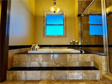This spacious 2-story custom pool home in the gated Los Lagos on Los Lagos Golf Club in Arizona - for sale on GolfHomes.com, golf home, golf lot