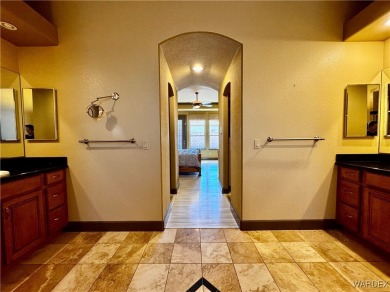 This spacious 2-story custom pool home in the gated Los Lagos on Los Lagos Golf Club in Arizona - for sale on GolfHomes.com, golf home, golf lot