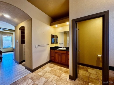 This spacious 2-story custom pool home in the gated Los Lagos on Los Lagos Golf Club in Arizona - for sale on GolfHomes.com, golf home, golf lot
