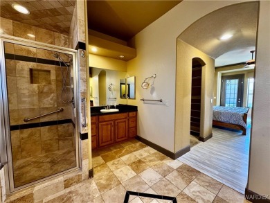 This spacious 2-story custom pool home in the gated Los Lagos on Los Lagos Golf Club in Arizona - for sale on GolfHomes.com, golf home, golf lot
