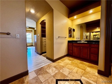 This spacious 2-story custom pool home in the gated Los Lagos on Los Lagos Golf Club in Arizona - for sale on GolfHomes.com, golf home, golf lot