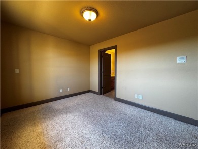 This spacious 2-story custom pool home in the gated Los Lagos on Los Lagos Golf Club in Arizona - for sale on GolfHomes.com, golf home, golf lot