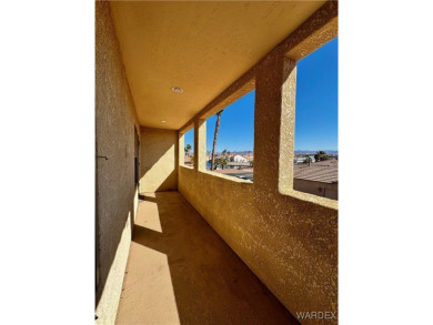 This spacious 2-story custom pool home in the gated Los Lagos on Los Lagos Golf Club in Arizona - for sale on GolfHomes.com, golf home, golf lot