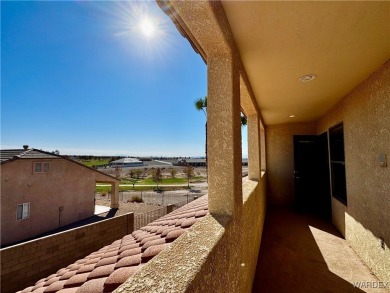 This spacious 2-story custom pool home in the gated Los Lagos on Los Lagos Golf Club in Arizona - for sale on GolfHomes.com, golf home, golf lot