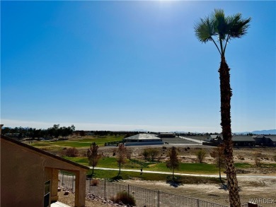 This spacious 2-story custom pool home in the gated Los Lagos on Los Lagos Golf Club in Arizona - for sale on GolfHomes.com, golf home, golf lot