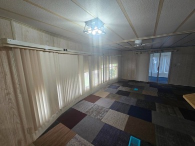 Charming & Renovated 2-Bedroom, 2-Bath Double-Wide in Vibrant on Vista Plantation Golf Club in Florida - for sale on GolfHomes.com, golf home, golf lot