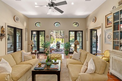 Tucked behind beautiful, private gates on a desirable corner lot on Sandestin Golf and Beach Resort - Raven in Florida - for sale on GolfHomes.com, golf home, golf lot