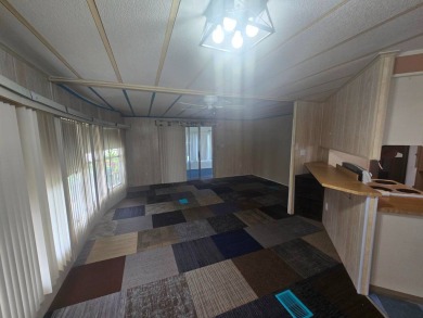 Charming & Renovated 2-Bedroom, 2-Bath Double-Wide in Vibrant on Vista Plantation Golf Club in Florida - for sale on GolfHomes.com, golf home, golf lot