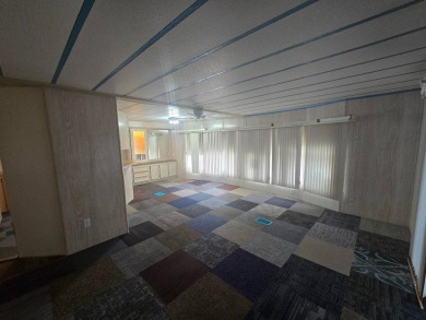 Charming & Renovated 2-Bedroom, 2-Bath Double-Wide in Vibrant on Vista Plantation Golf Club in Florida - for sale on GolfHomes.com, golf home, golf lot