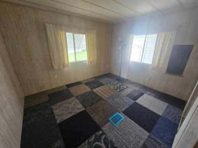 Charming & Renovated 2-Bedroom, 2-Bath Double-Wide in Vibrant on Vista Plantation Golf Club in Florida - for sale on GolfHomes.com, golf home, golf lot