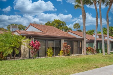 Discover an impeccable, fully renovated 2BR/2BA waterfront villa on Boca Lago Golf and Country Club in Florida - for sale on GolfHomes.com, golf home, golf lot