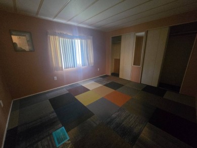 Charming & Renovated 2-Bedroom, 2-Bath Double-Wide in Vibrant on Vista Plantation Golf Club in Florida - for sale on GolfHomes.com, golf home, golf lot