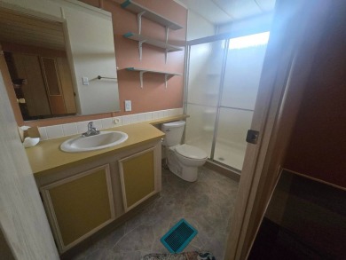 Charming & Renovated 2-Bedroom, 2-Bath Double-Wide in Vibrant on Vista Plantation Golf Club in Florida - for sale on GolfHomes.com, golf home, golf lot