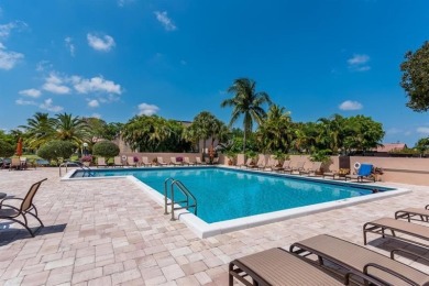 Discover an impeccable, fully renovated 2BR/2BA waterfront villa on Boca Lago Golf and Country Club in Florida - for sale on GolfHomes.com, golf home, golf lot