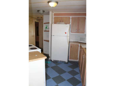 Charming & Renovated 2-Bedroom, 2-Bath Double-Wide in Vibrant on Vista Plantation Golf Club in Florida - for sale on GolfHomes.com, golf home, golf lot