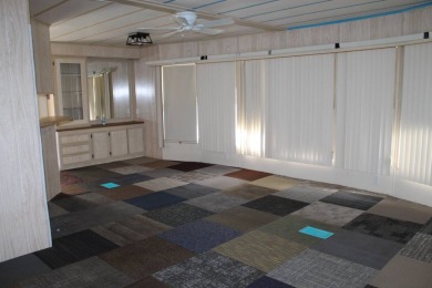 Charming & Renovated 2-Bedroom, 2-Bath Double-Wide in Vibrant on Vista Plantation Golf Club in Florida - for sale on GolfHomes.com, golf home, golf lot