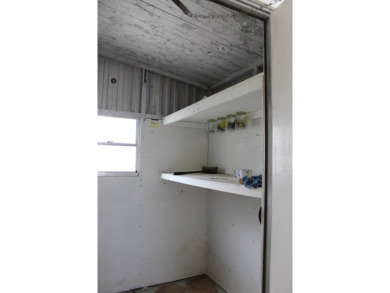 Charming & Renovated 2-Bedroom, 2-Bath Double-Wide in Vibrant on Vista Plantation Golf Club in Florida - for sale on GolfHomes.com, golf home, golf lot