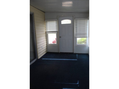 Charming & Renovated 2-Bedroom, 2-Bath Double-Wide in Vibrant on Vista Plantation Golf Club in Florida - for sale on GolfHomes.com, golf home, golf lot