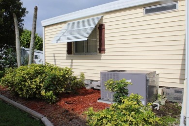 Charming & Renovated 2-Bedroom, 2-Bath Double-Wide in Vibrant on Vista Plantation Golf Club in Florida - for sale on GolfHomes.com, golf home, golf lot
