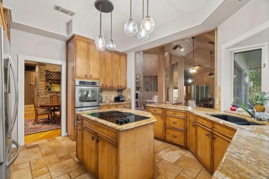 Bathed in natural light and framed by serene golf course and on Slick Rock Golf Course - Horseshoe Bay in Texas - for sale on GolfHomes.com, golf home, golf lot