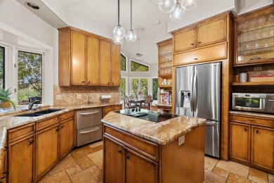 Bathed in natural light and framed by serene golf course and on Slick Rock Golf Course - Horseshoe Bay in Texas - for sale on GolfHomes.com, golf home, golf lot