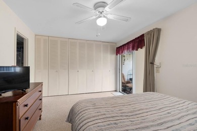 Set on a quiet dead-end street with a lush treelined green space on Sandpiper Golf Club in Florida - for sale on GolfHomes.com, golf home, golf lot