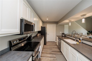 Welcome to this beautiful two-story lofted condo located in the on  in Ohio - for sale on GolfHomes.com, golf home, golf lot