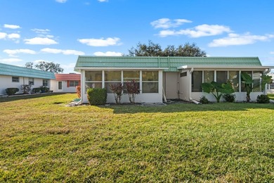 Set on a quiet dead-end street with a lush treelined green space on Sandpiper Golf Club in Florida - for sale on GolfHomes.com, golf home, golf lot