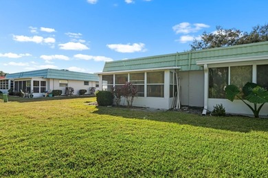 Set on a quiet dead-end street with a lush treelined green space on Sandpiper Golf Club in Florida - for sale on GolfHomes.com, golf home, golf lot