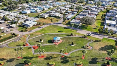 Set on a quiet dead-end street with a lush treelined green space on Sandpiper Golf Club in Florida - for sale on GolfHomes.com, golf home, golf lot