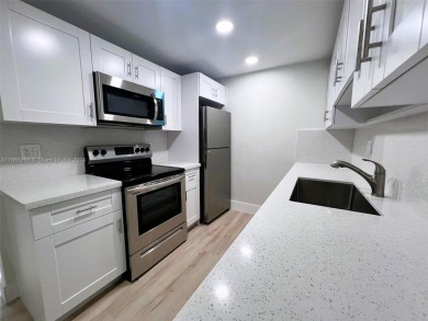 Welcome to a beautifully renovated apartment in the community of on Wynmoor Golf Course in Florida - for sale on GolfHomes.com, golf home, golf lot
