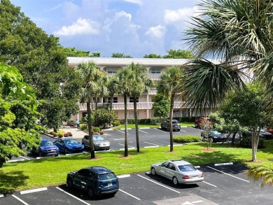 Welcome to a beautifully renovated apartment in the community of on Wynmoor Golf Course in Florida - for sale on GolfHomes.com, golf home, golf lot