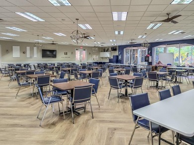 Set on a quiet dead-end street with a lush treelined green space on Sandpiper Golf Club in Florida - for sale on GolfHomes.com, golf home, golf lot