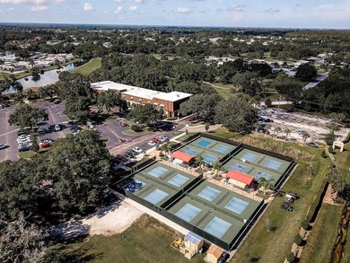 Set on a quiet dead-end street with a lush treelined green space on Sandpiper Golf Club in Florida - for sale on GolfHomes.com, golf home, golf lot