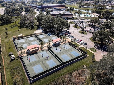 Set on a quiet dead-end street with a lush treelined green space on Sandpiper Golf Club in Florida - for sale on GolfHomes.com, golf home, golf lot