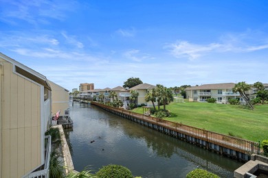 This stunning 2-bedroom, 2-bath canal-front condo is a must-see! on Sandpiper Cove Golf Course in Florida - for sale on GolfHomes.com, golf home, golf lot