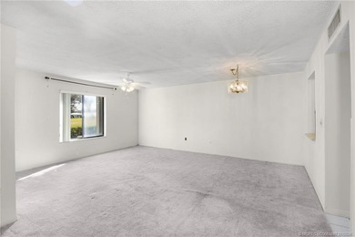 First floor 1 Bedroom / 2 Bath end unit condo in the Miles Grant on Miles Grant Country Club in Florida - for sale on GolfHomes.com, golf home, golf lot