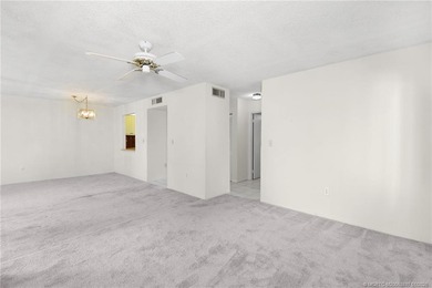 First floor 1 Bedroom / 2 Bath end unit condo in the Miles Grant on Miles Grant Country Club in Florida - for sale on GolfHomes.com, golf home, golf lot