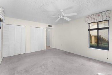 First floor 1 Bedroom / 2 Bath end unit condo in the Miles Grant on Miles Grant Country Club in Florida - for sale on GolfHomes.com, golf home, golf lot