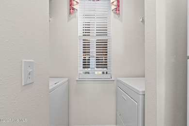 You don't want to miss out on this fully furnished 2-bed 2-bath on Sandpiper Bay Golf and Country Club in North Carolina - for sale on GolfHomes.com, golf home, golf lot