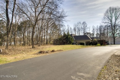 This picturesque lakefront lot, features a flat and gently on Tanasi Golf Course in Tennessee - for sale on GolfHomes.com, golf home, golf lot