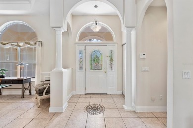 Welcome to 68 Egret Trail - A Golf Course Pool Home in the Heart on The Grand Club Cypress Course in Florida - for sale on GolfHomes.com, golf home, golf lot