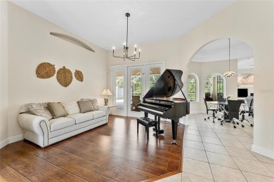 Welcome to 68 Egret Trail - A Golf Course Pool Home in the Heart on The Grand Club Cypress Course in Florida - for sale on GolfHomes.com, golf home, golf lot